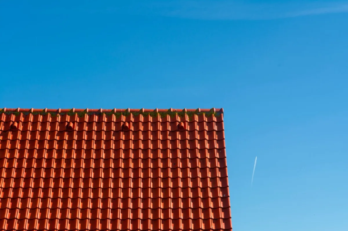 Tile roof gable in full sun, the kind of exposure that sets roof life in Keller, TX